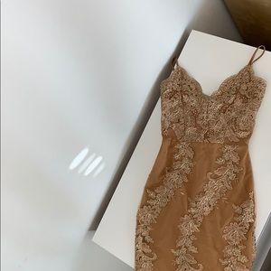 Gold dress with detailing